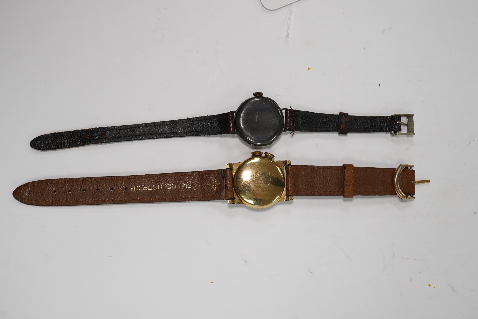 A gentleman's 1940's 10k gold filled Longines Weems? manual wind wrist watch, lacking dial, case diameter 28mm, together with a lady's silver wrist watch. Condition - poor to fair